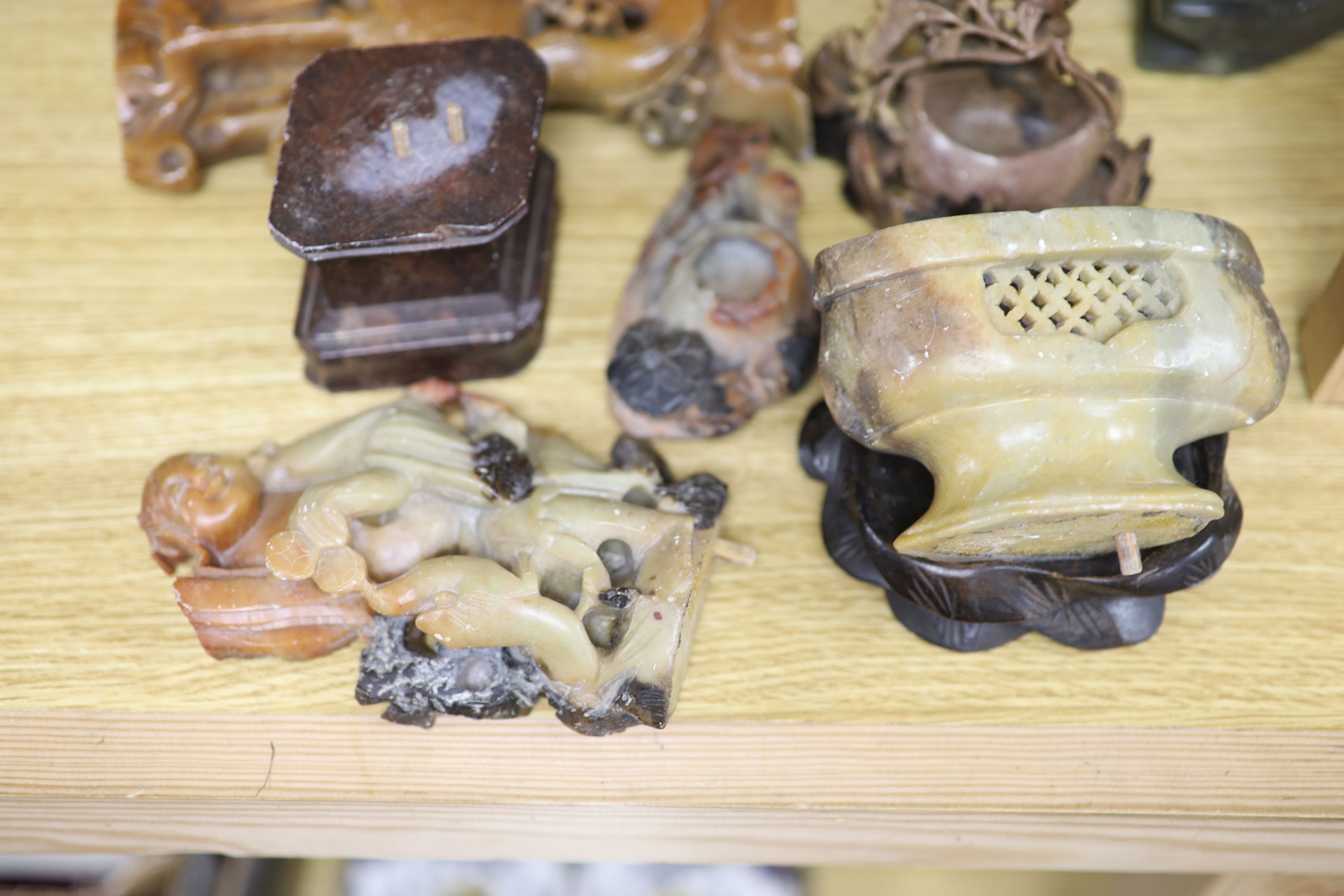 A collection of hardstone and soapstone carvings